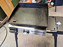 Griddle cooking surface.